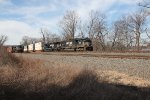 NS 1802 takes a train east at MP116